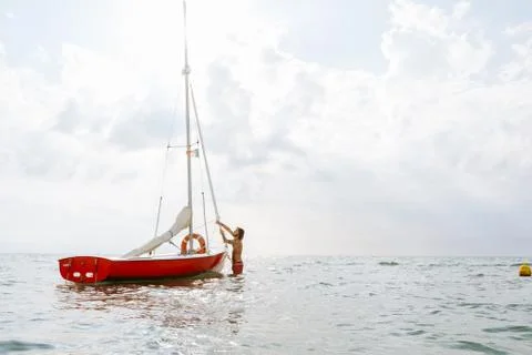 Man preparing sailboat Stock Photos