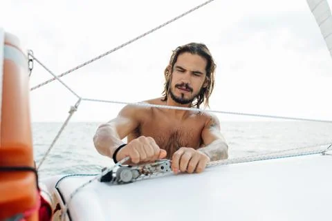Man preparing sailboat Stock Photos