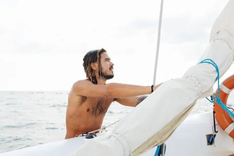 Man preparing sailboat Stock Photos