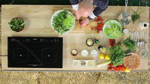 Man preparing salad top view Stock Footage 74456437