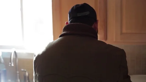 Man Preparing Salsa by Sunlit Window Video stock 76014382