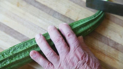 Man preparing silk squash Stock Footage