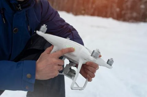 Man preparing for starting with drone. Stock Photos