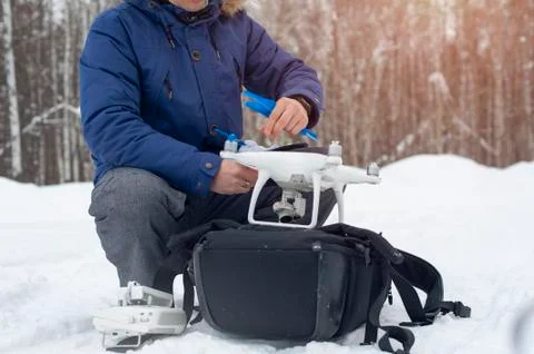 Man preparing for starting with drone. Stock Photos