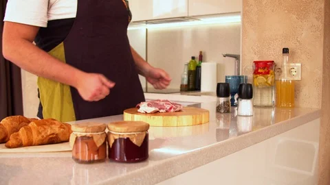 Man preparing steak in a kitchen Stock-Footage 130059780