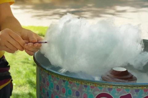 The man is preparing sugar candy. Close-up. Stock Photos