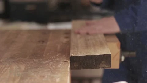 Man preparing surface table for wood working close up workshop indoors blue  動画素材 88027761