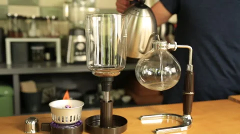 The man is preparing Syphon Coffee Stock Footage 65483832