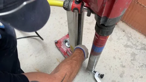 Man is preparing tha machine to work Vidéo 217387931