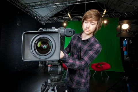 Man preparing a tv studio camera Stock Photos