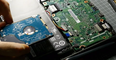 Man preparing to upgrade the computer with SSD and faster ram Video stock 69257068