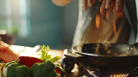 Man preparing vegetables in kitchen Stock Footage 311834965