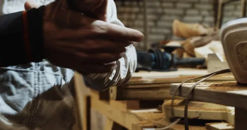 Man Preparing For Working In Workshop Stock Footage 125894164