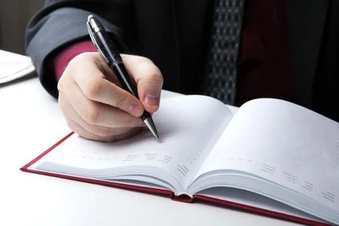 Man is preparing for written work Stock Photos