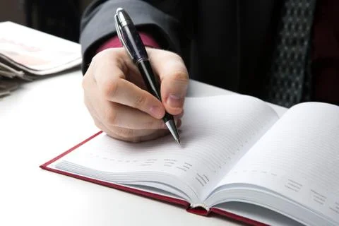 Man is preparing for written work Stock Photos