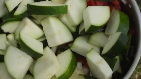 Man preparing zucchini in the open air close up Stock Footage 80240906