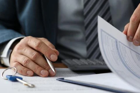 Man in presentable grey suit Stock Photos