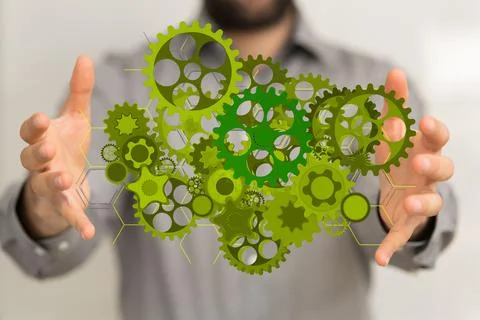 Man presenting a 3D rendered green setting icons, concept of eco green environme Stock Photos