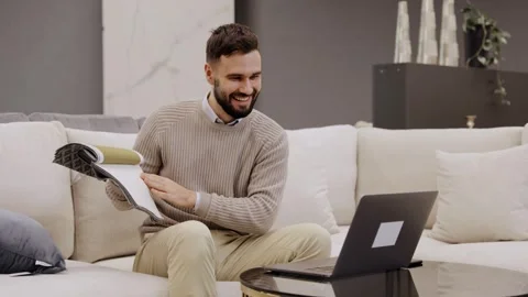 Man presenting fabric samples during online consultation Stock Footage 322550180