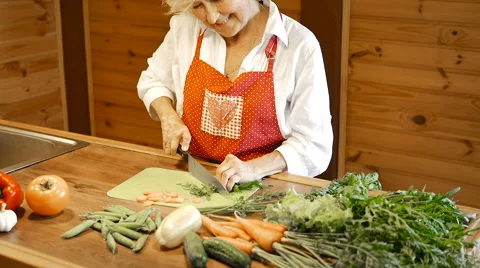 Man presenting flowers to his elderly wife. Stock Footage 65743603