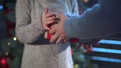 Man presenting a gift to his girlfriend Stock Footage 70071700