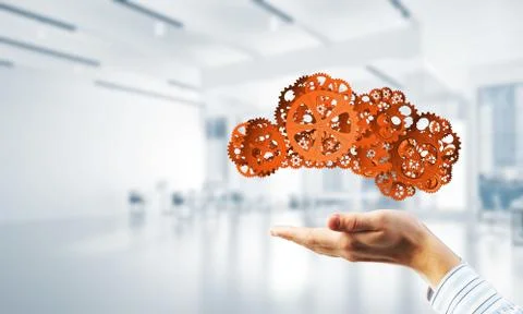 Man presenting in his palms cloud computing concept as mechanism of cogwheels Stock Photos
