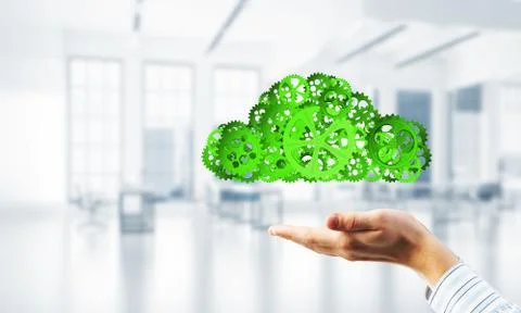 Man presenting in his palms cloud computing concept as mechanism of cogwheels 스톡 사진