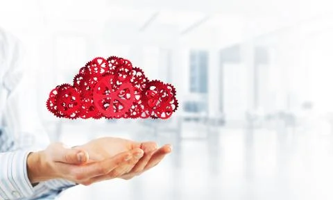 Man presenting in his palms cloud computing concept as mechanism of cogwheels Stock Photos
