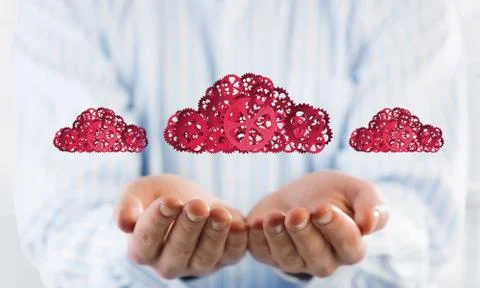 Man presenting in his palms cloud computing concept as mechanism of cogwheels 스톡 사진