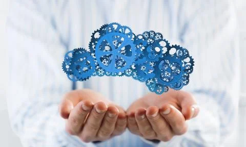 Man presenting in his palms cloud computing concept as mechanism of cogwheels Foto stock
