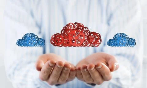 Man presenting in his palms cloud computing concept as mechanism of cogwheels Stock Photos