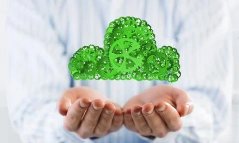 Man presenting in his palms cloud computing concept as mechanism of cogwheels Stock Photos