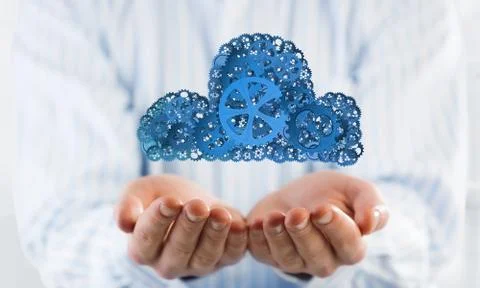 Man presenting in his palms cloud computing concept as mechanism of cogwheels 스톡 사진