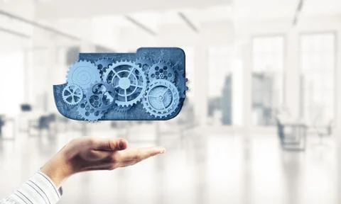 Man presenting in his palms cloud computing concept as mechanism Foto stock