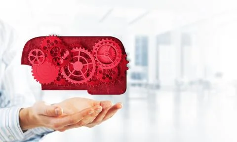 Man presenting in his palms cloud computing concept as mechanism of cogwheels Stock Photos