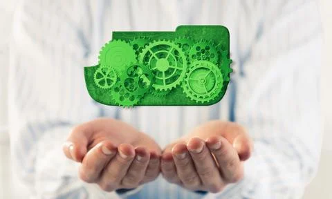 Man presenting in his palms cloud computing concept as mechanism 스톡 사진