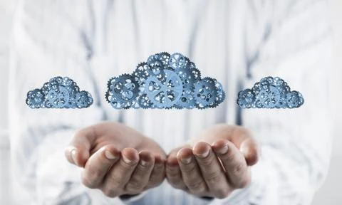 Man presenting in his palms cloud computing concept as mechanism Stock Photos