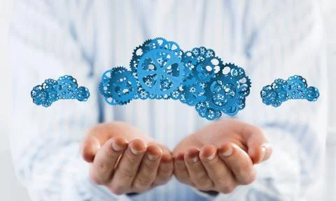 Man presenting in his palms cloud computing concept as mechanism of cogwheels Stock Photos