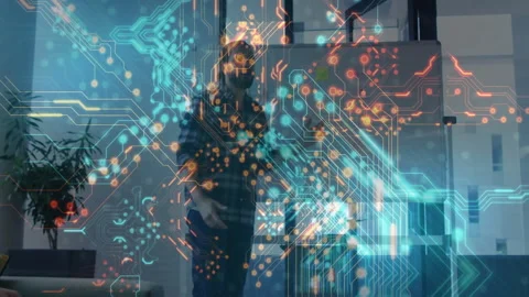 Man presenting holographic circuit data pathways in technology office using Stock Footage 307432952