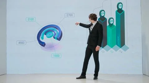 Man presenting project on stage during meeting. A businessman talks to the 스톡 사진