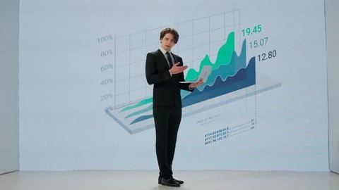 Man presenting project on stage during meeting. A businessman talks to the 스톡 사진