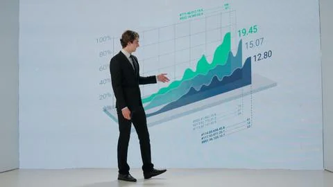 Man presenting project on stage during meeting. A businessman talks to the Foto stock