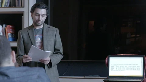 Man Presenting Research During Business Meeting Stock Footage 343974697