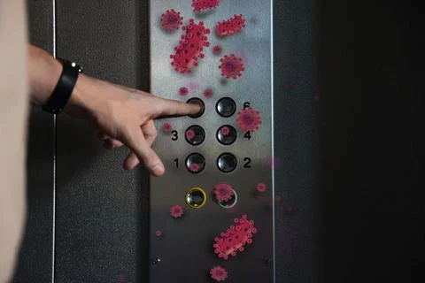 Man press button in elevator with germs, closeup Foto stock