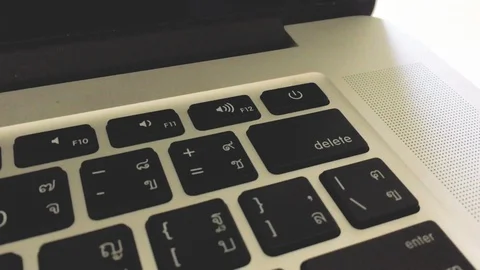 Man press power button lap top Stock Footage 97437586