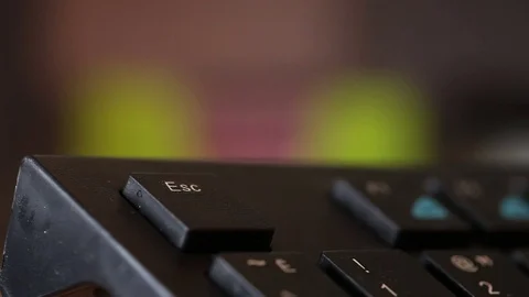 Man presses the black button escape. Macro shooting Stock Footage 72560640