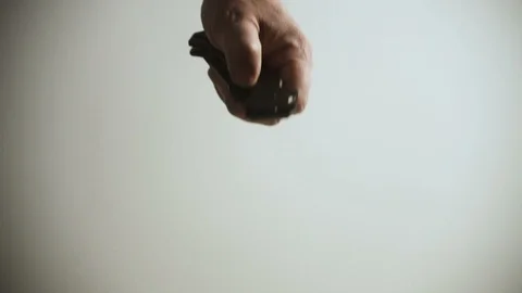 The man presses the button and opens the knife blade Stock Footage 100878637