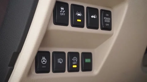 Man presses button and turns on air conditioner to regulate heat in car Video stock 169030058