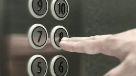 Man presses a button the eighth floor in an elevator Video stock 51468436