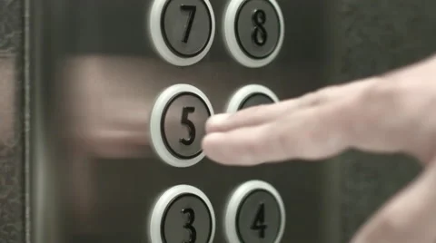 Man presses a button the fifth floor in an elevator 動画素材 51468176